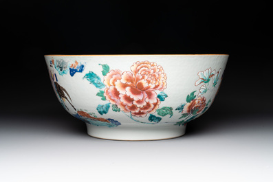 A fine Chinese famille rose bowl with figures, flowers and pheasants, Yongzheng/Qianlong
