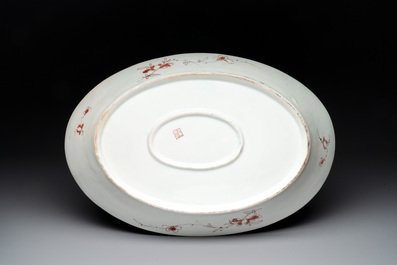 Five Imari-style plates, a dish and an oval charger with the arms of Guillot, Samson, Paris, 19th C.