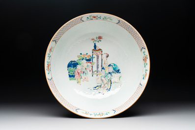 A fine Chinese famille rose bowl with figures, flowers and pheasants, Yongzheng/Qianlong