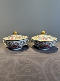 A pair of Chinese Canton famille rose two-handled bowls and covers with narrative design, Daoguang mark and of the period