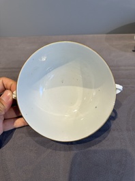 A pair of Chinese Canton famille rose two-handled bowls and covers with narrative design, Daoguang mark and of the period
