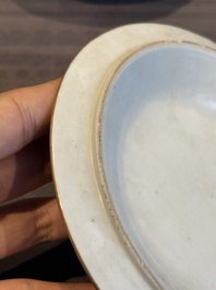 A pair of Chinese Canton famille rose two-handled bowls and covers with narrative design, Daoguang mark and of the period