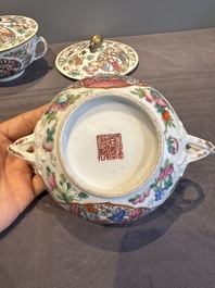 A pair of Chinese Canton famille rose two-handled bowls and covers with narrative design, Daoguang mark and of the period