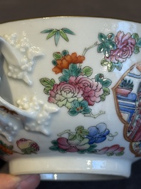 A pair of Chinese Canton famille rose two-handled bowls and covers with narrative design, Daoguang mark and of the period