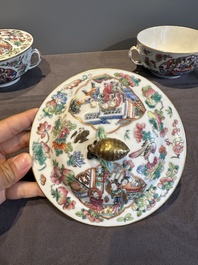 A pair of Chinese Canton famille rose two-handled bowls and covers with narrative design, Daoguang mark and of the period