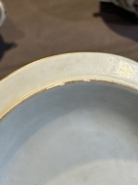A pair of Chinese Canton famille rose two-handled bowls and covers with narrative design, Daoguang mark and of the period