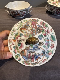 A pair of Chinese Canton famille rose two-handled bowls and covers with narrative design, Daoguang mark and of the period