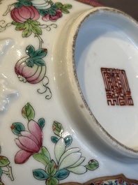 A pair of Chinese Canton famille rose two-handled bowls and covers with narrative design, Daoguang mark and of the period
