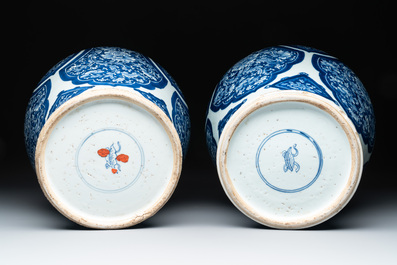 A pair of Chinese blue and white 'peony scroll' vases, Kangxi