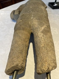 A sandstone torso and a Buddha head, Cambodia, late Khmer period, 13/14th C.