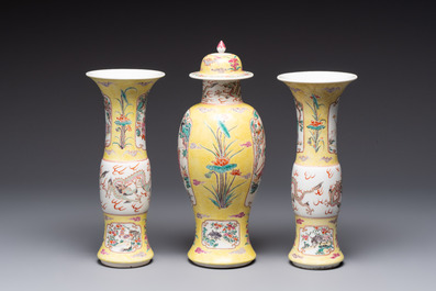 A famille rose-style garniture of three vases, Samson, Paris, 19th C.
