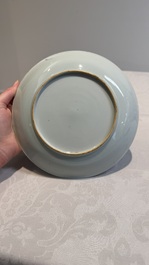 A Chinese blue and white 'phoenix and monkeys' dish and a pair of powder-blue-ground plates, Kangxi/Yongzheng