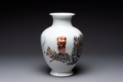 A Chinese iron-red-decorated grisaille '18 Luohan' vase, Qianlong mark, dated 1993