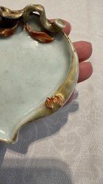A Chinese iron-red gilt-decorated celadon-glazed peach-shaped brushwasher, 18th C.