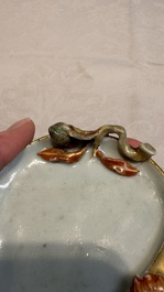 A Chinese iron-red gilt-decorated celadon-glazed peach-shaped brushwasher, 18th C.