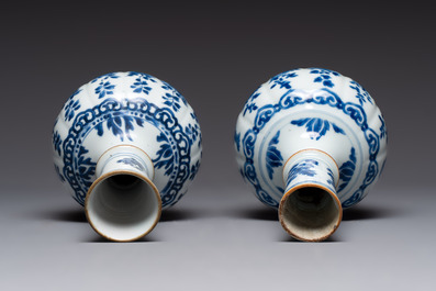 A pair of Chinese blue and white hookah bases with floral design, Kangxi