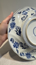 A Chinese blue and white 'phoenix and monkeys' dish and a pair of powder-blue-ground plates, Kangxi/Yongzheng