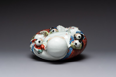 A Chinese famille rose black-ground covered vase and a famille rose Milefo Buddha, Mao Ji Sheng 茂記生造 mark, 19/20th C.