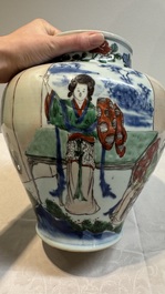 A Chinese wucai vase and cover with court ladies and playing boys, Transitional period
