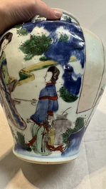 A Chinese wucai vase and cover with court ladies and playing boys, Transitional period