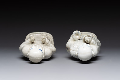A pair of Chinese blue and white crackle-glazed monks, 19th C.