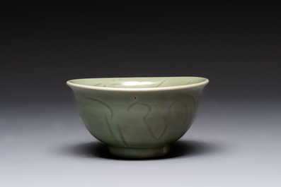 A Chinese Longquan celadon 'gu' vase with 'anhua' floral design and a bowl, Ming