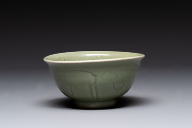 A Chinese Longquan celadon 'gu' vase with 'anhua' floral design and a bowl, Ming