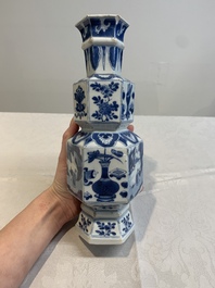 A Chinese blue and white hexagonal vase with figures and antiquities, Kangxi