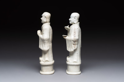 A pair of Chinese blue and white crackle-glazed monks, 19th C.