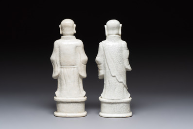 A pair of Chinese blue and white crackle-glazed monks, 19th C.