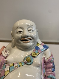 A Chinese famille rose Milefo Buddha on wooden stand, 19th C.