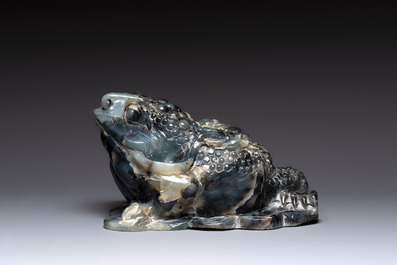 A Chinese jade group of an imperial carriage with mythical beasts and a large three-legged toad, 20th C.