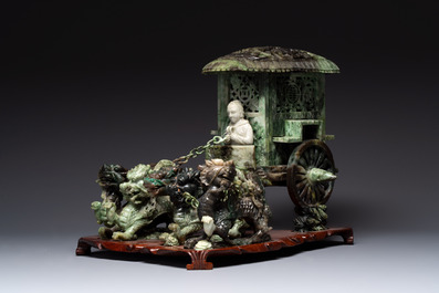 A Chinese jade group of an imperial carriage with mythical beasts and a large three-legged toad, 20th C.