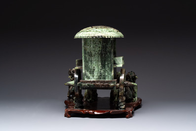 A Chinese jade group of an imperial carriage with mythical beasts and a large three-legged toad, 20th C.