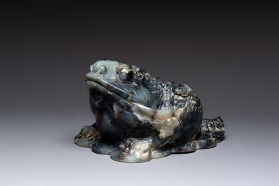 A Chinese jade group of an imperial carriage with mythical beasts and a large three-legged toad, 20th C.