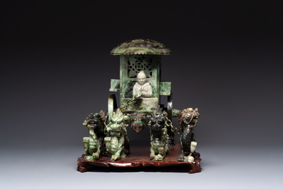 A Chinese jade group of an imperial carriage with mythical beasts and a large three-legged toad, 20th C.