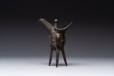 A Chinese bronze ritual wine vessel and a Japanese jardini&egrave;re, 17/19th C.