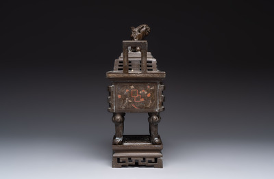 A large Vietnamese copper- and silver-inlaid rectangular 'Buddhist lion' censer and cover on stand, 19th C.