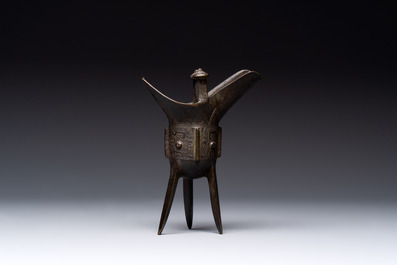 A Chinese bronze ritual wine vessel and a Japanese jardini&egrave;re, 17/19th C.