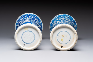 A pair of Chinese blue and white 'gu' vases with floral design, Kangxi