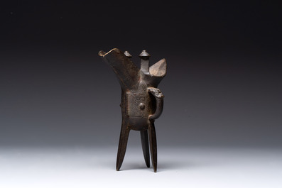 A Chinese bronze ritual wine vessel and a Japanese jardini&egrave;re, 17/19th C.