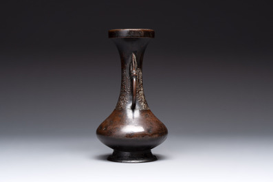 A Chinese archaistic bronze vase and three Japanese bronze vases, 14/18th C.