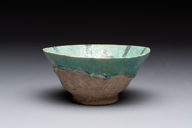 A turquoise-glazed calligraphic dish and a bowl, Kashan, 13/14th C.