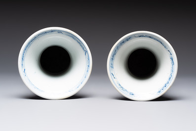 A pair of Chinese blue and white 'gu' vases with floral design, Kangxi