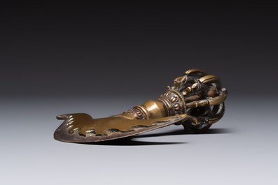 A Tibetan brass and iron kartika with incised dragon design, 19th C.