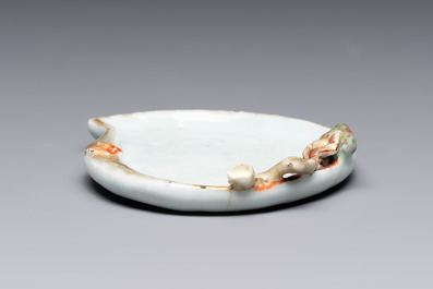 A Chinese iron-red gilt-decorated celadon-glazed peach-shaped brushwasher, 18th C.