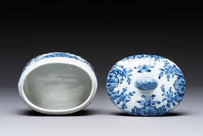 A small blue and white Dutch Delft tureen and cover with a foal finial, 18th C.