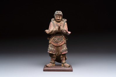 A Chinese polychrome lacquered wooden sculpture of Weituo, 17/18th C.