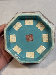 A Chinese iron-red gilt-decorated octagonal 'trigrams' bowl, Tongzhi mark and of the period