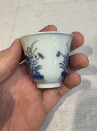 A pair of Chinese doucai 'narcissus' wine cups, Guangxu mark and of the period